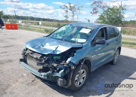 2015 Honda Cr-V Lx z USA, uszkodzony, nr VIN 2HKRM3H32FH532874